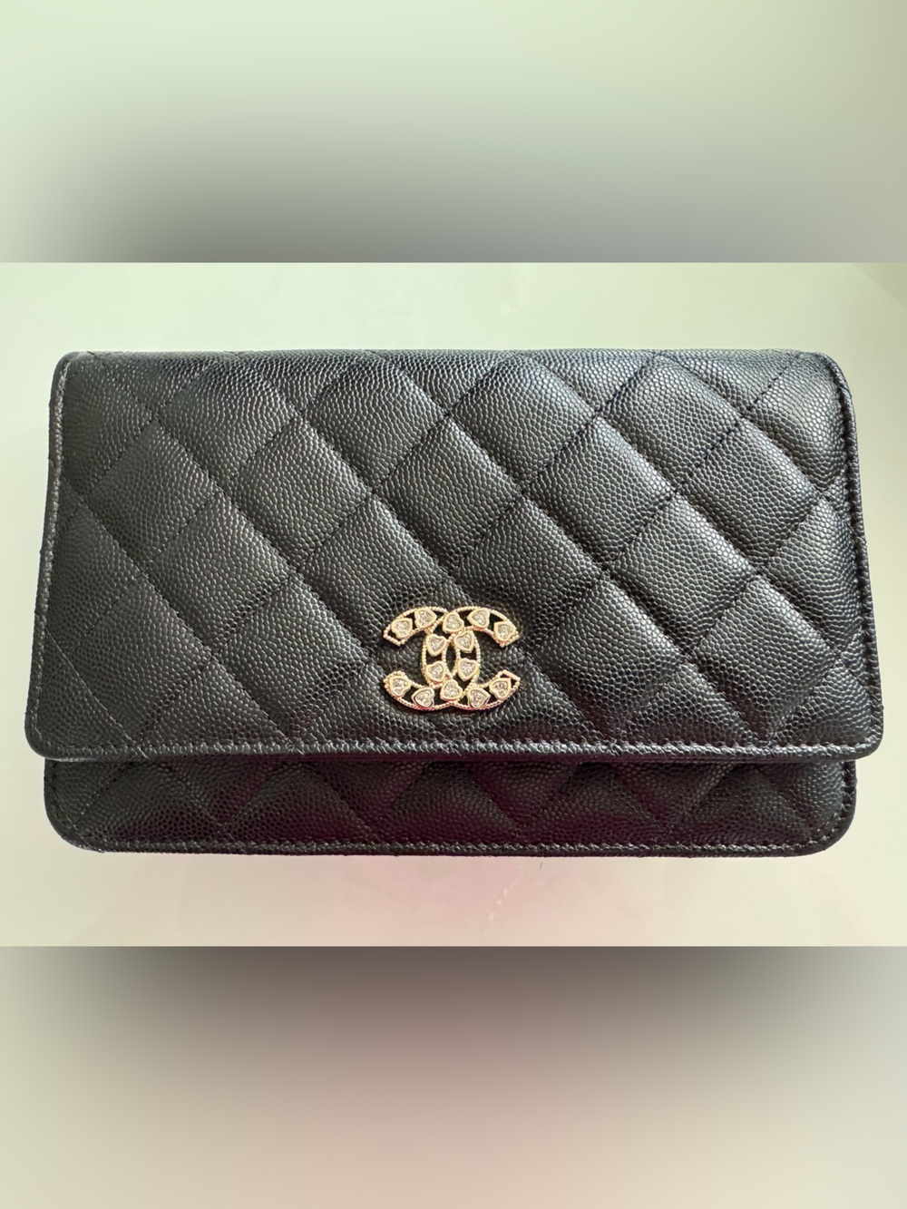 CHANEL WOC Black caviar leather with Gold Hardware and heart shaped crystal logo